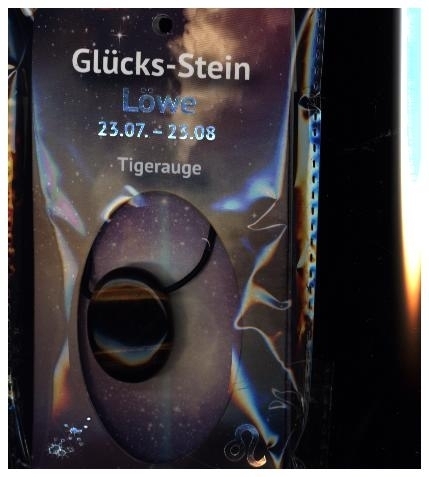 Glücksstein mit Band auf Astrokarte Löwe/Tigerauge
