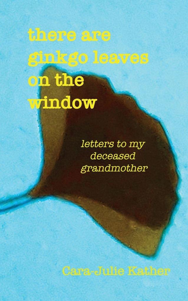there are ginkgo leaves on the window