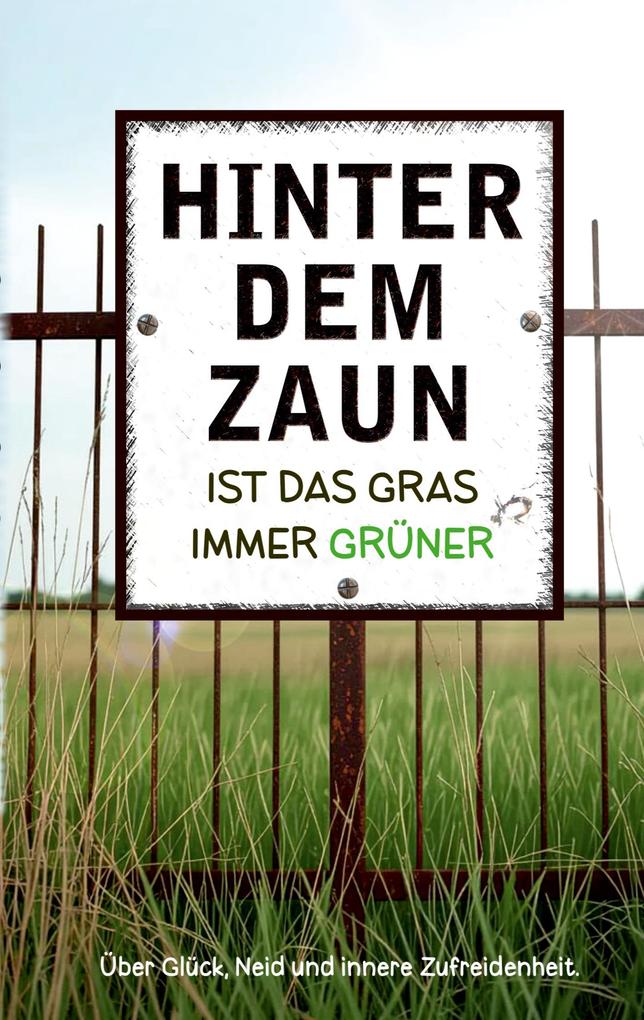 Hinter dem Zaun ist das Gras immer grüner
